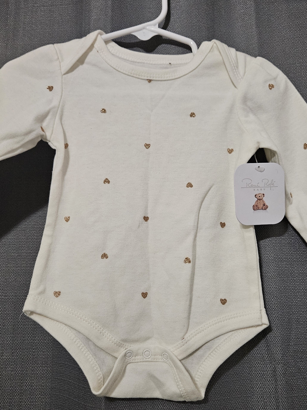 Rene Rofe Cream Long-Sleeve One-Piece with Gold Heart Accents